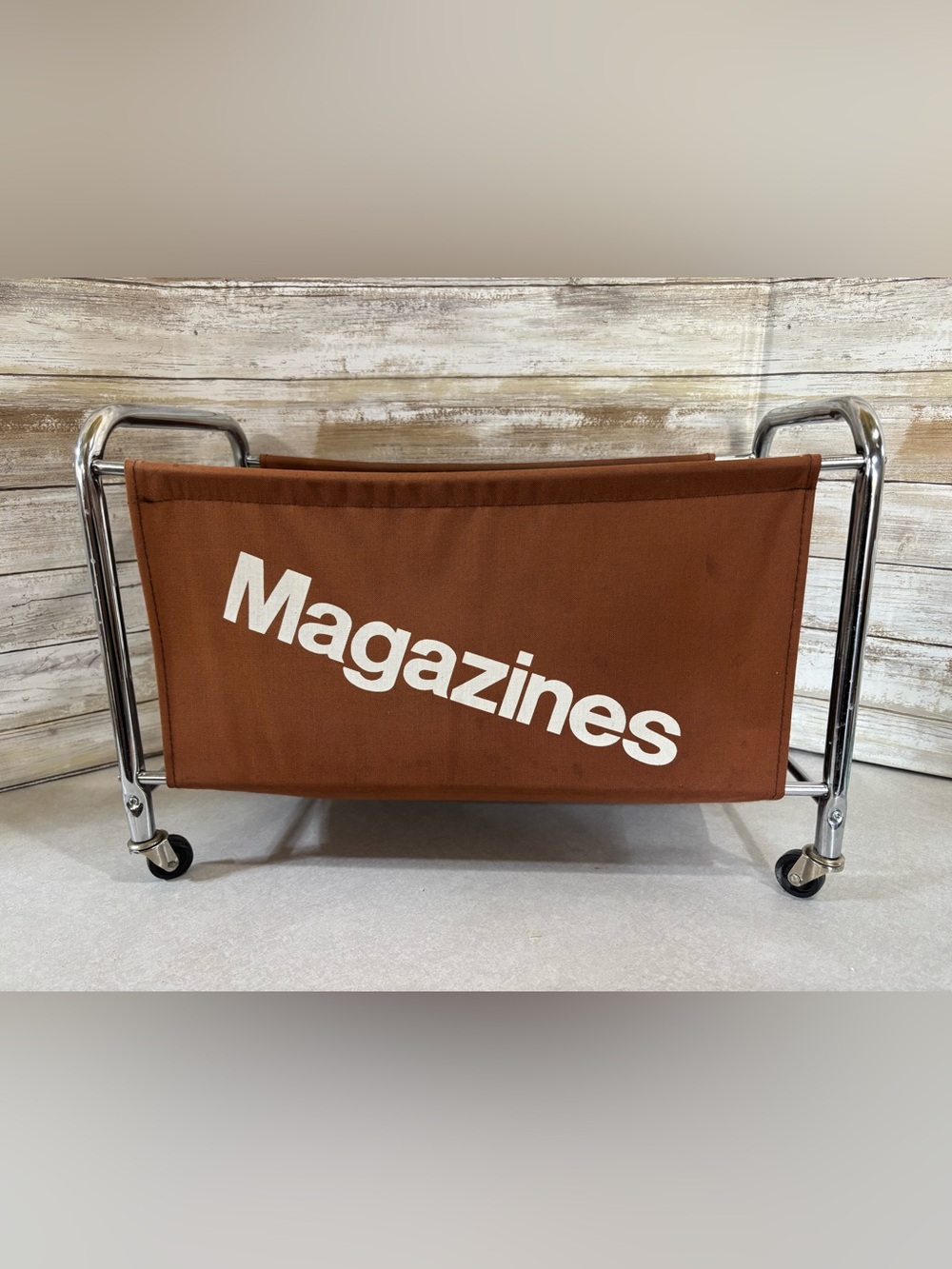 Vintage MCM canvas and chrome wheeled magazine rack